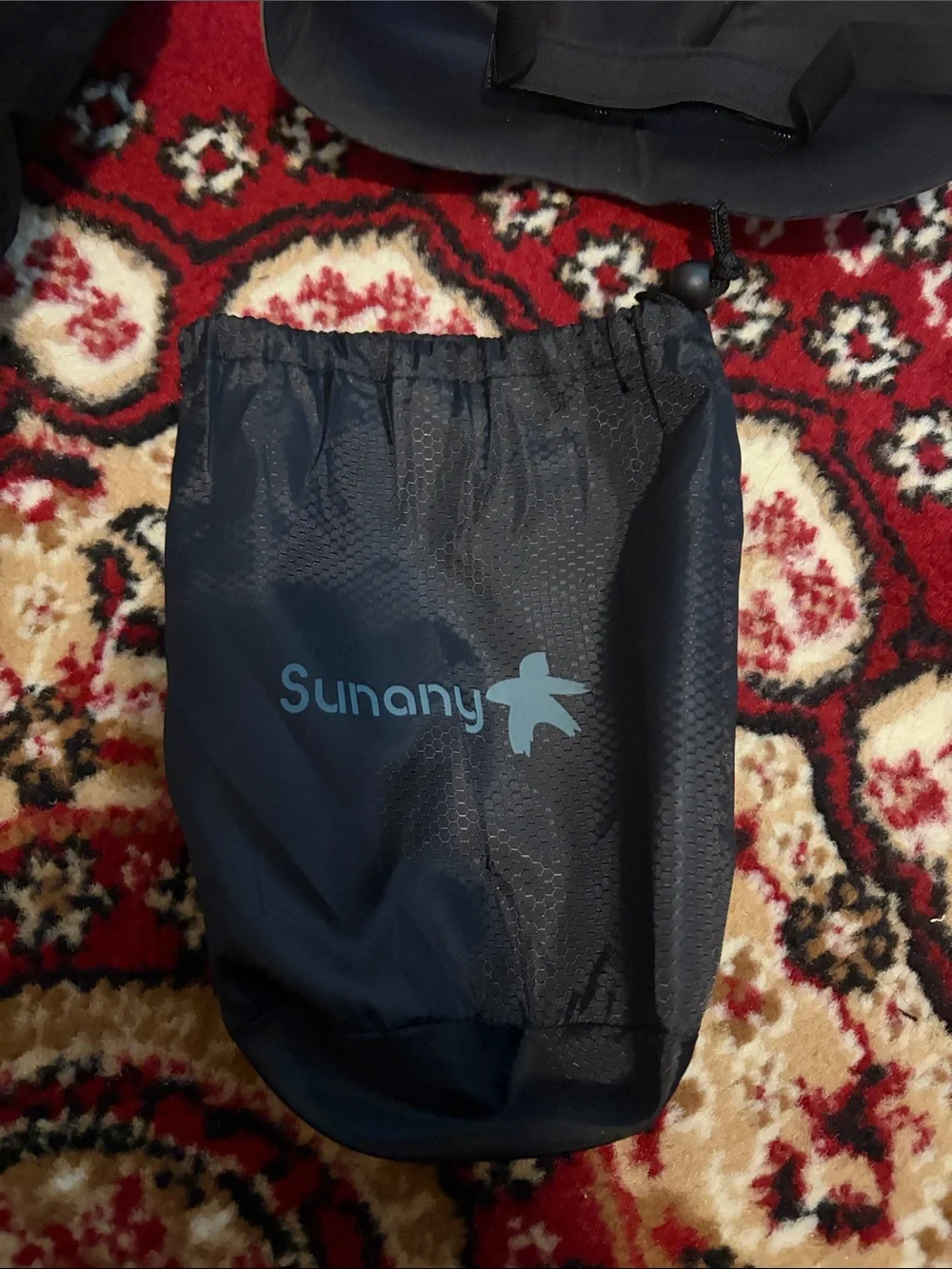 SUNO Black Inflatable Travel Hood Pillow with Gray Eye Mask and Orange Earplugs